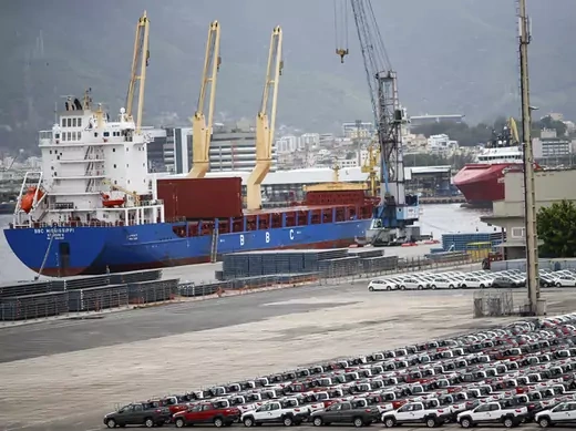 Hundreds of cars stand in the port of Rio de Janeiro