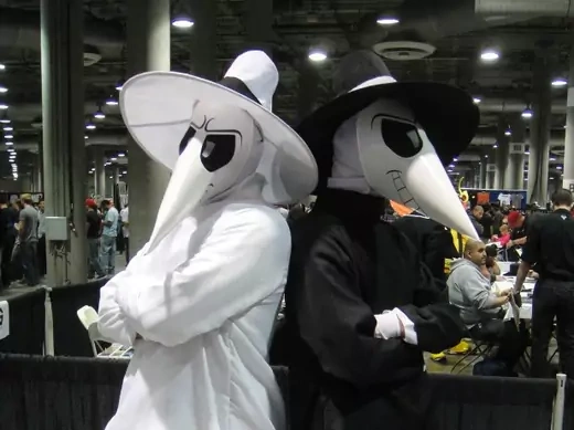Chinese security researchers walk a fine line between "white hat" and "black hat." (Source: <a href="https://commons.wikimedia.org/wiki/File:Comikaze_Expo_2011_-_Spy_vs_Spy_(6325381362).jpg">Doug Kline</a>)