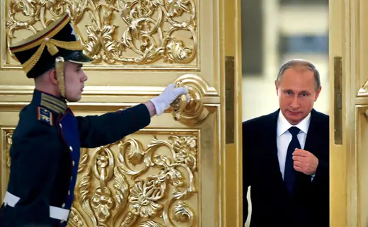 Russian President Vladimir Putin attends a meeting at the Kremlin. 