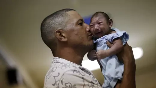 Geovane Silva holds his son Gustavo Henrique, who has microcephaly, at the Oswaldo Cruz Hospital in Recife, Brazil.