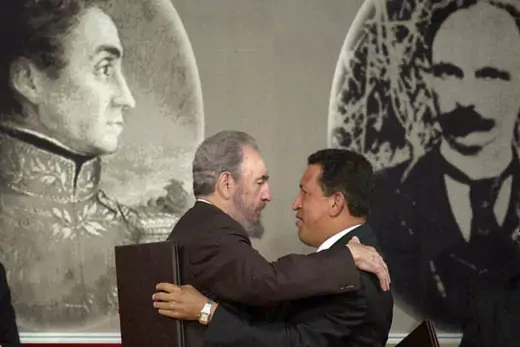 Castro and Chavez at Miraflores palace after signing an oil pact. AP Images/Fernando Llano