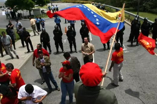 Members of the Venezuelan Communist Party and Chavez supporters rally outside the U.S. embassy in Caracas.  VENEZUELA