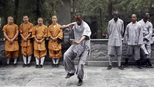 An African student practices Shaolin martial arts in Henan Province.