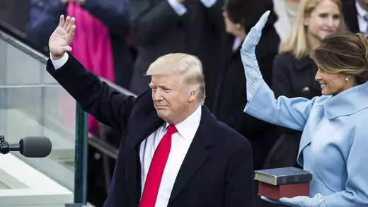 President Donald Trump and First Lady Melania Trump wave to the crowds during the 58th U.S. Presidential Inauguration. 