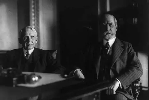 Frank B. Kellogg, Ambassador to England, and Secretary of State Hughes in Mr. Hughes' office on the day of the announcement of Kellogg's appointment as Hughes's successor. 