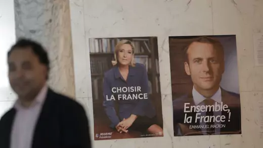 Campaign posters on display for presidential candidates Marine Le Pen and Emmanuel Macron during the second round of the French presidential election.