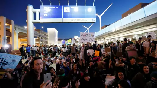 Demonstrators shut down the lower level loop at LAX during a protest against the travel ban imposed by U.S. President Donald Trump's executive order in Los Angeles, California.