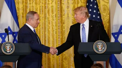 U.S. President Trump greets Israeli Prime Minister Netanyahu after a joint news conference at the White House.