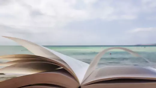 Book open on a beach