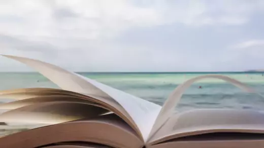 Book open on a beach
