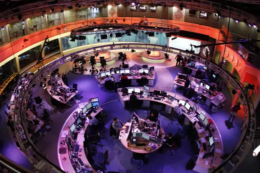 Al Jazeera English covers the 2011 Arab uprisings at its Doha headquarters.