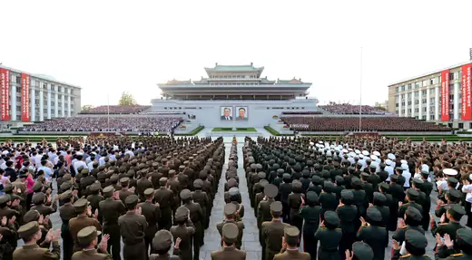 A rally celebrating the success of a recent nuclear test is held in Kim Il Sung square.