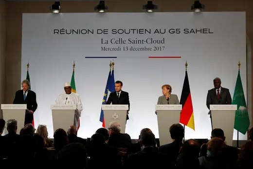 Italian Prime Minister Paolo Gentiloni, Mali’s President Ibrahim Boubacar Keita, French President Emmanuel Macron, German Chancellor Angela Merkel, and African Union Commission President Moussa Faki Mahamat attend a media conference on the G5 Sahel.