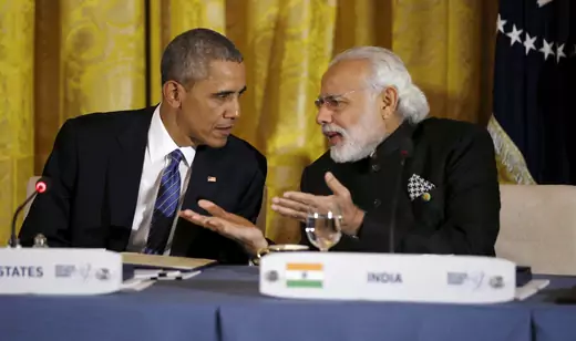 U.S. President Barack Obama talks with Indian Prime Minister Narendra Modi (R) during a working dinner at the White House with heads of delegations attending the Nuclear Security Summit in Washington March 31, 2016. REUTERS/Kevin Lamarque