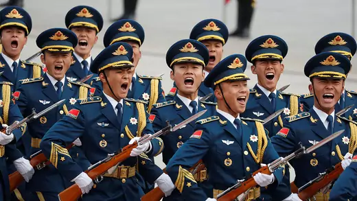 Military troops march during a welcoming ceremony for U.S. President Donald Trump in Beijing, China.