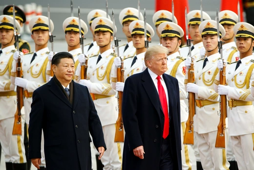 U.S. President Donald Trump takes part in a welcoming ceremony with China's President Xi Jinping in Beijing, China, November 9, 2017. REUTERS/Thomas Peter