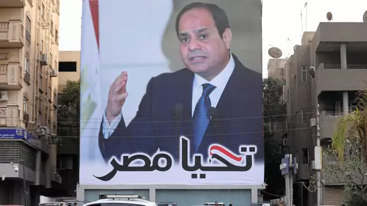 Cars pass by a poster of Egypt's President Abdel Fattah al-Sisi for the upcoming presidential election, in Cairo, Egypt, February 19, 2018. The writing on the poster reads: "Long live Egypt". REUTERS/Mohamed Abd El Ghany