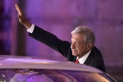 Leftist front-runner Andres Manuel Lopez Obrador of the National Regeneration Movement (MORENA) gestures while leaving the Palacio de Mineria after the first presidential debate in Mexico City, Mexico April 22, 2018.