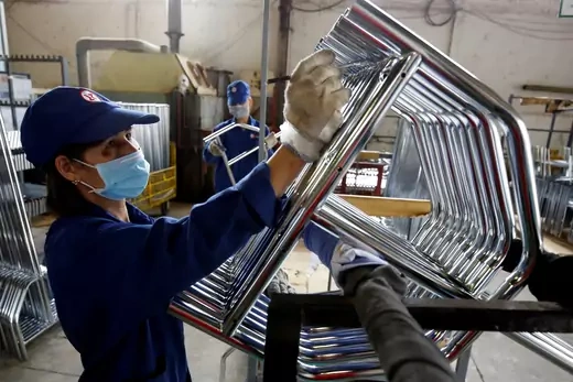 Women work at Xuan Hoa furniture factory in Hanoi, Vietnam April 5, 2018. 
