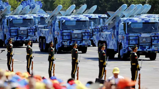 China's People's Liberation Army (PLA) navy soldiers on their armored vehicles carrying ship-to-air missiles roll to Tiananmen Square during the military parade marking the 70th anniversary of the end of World War Two, in Beijing, China, September 3, 2015.