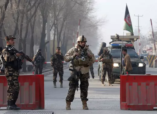 Afghan security forces keep watch at a check point close to a compound of Afghanistan's national intelligence agency in Kabul, Afghanistan. December 25, 2017. Omar Sobhani/Reuters