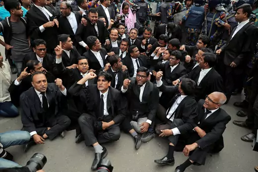 Lawyers supporting Bangladesh Nationalist Party (BNP) shout slogans as they sit on a street during a protest in Dhaka, Bangladesh February 8, 2018. REUTERS/Mohammad Ponir Hossain
