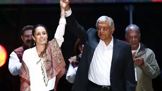 Claudia Sheinbaum (L), candidate for Mexico City Mayor, and Mexican presidential candidate Andres Manuel Lopez Obrador gesture during a closing campaign rally.