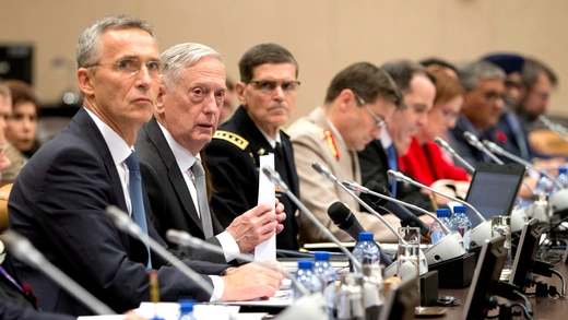 U.S. Secretary of Defense and NATO Secretary General at a NATO meeting