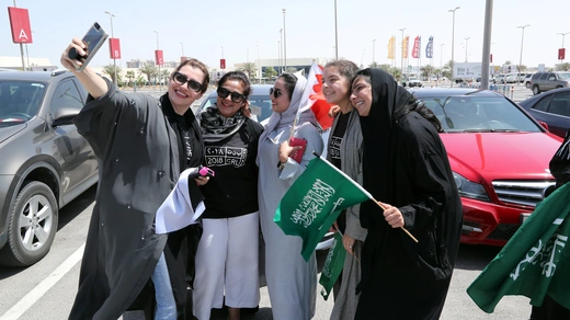 Saudi women celebrate the lifting of the driving ban on women in east Saudi Arabia.