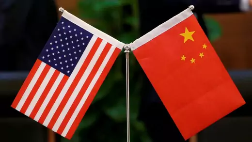 Chinese and U.S. flags are set up for a signing ceremony at China's Ministry of Transport in Beijing.