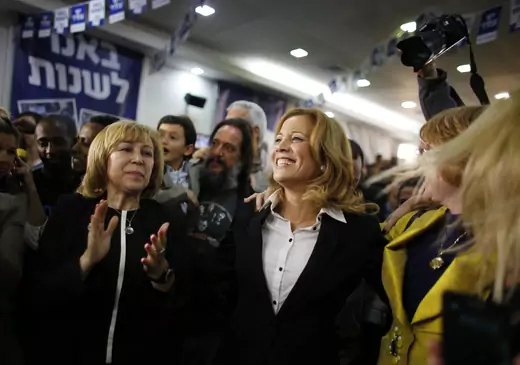 Dr. Aliza Lavie celebrates exit poll results at the Yesh Atid party's headquarters in Tel Aviv.