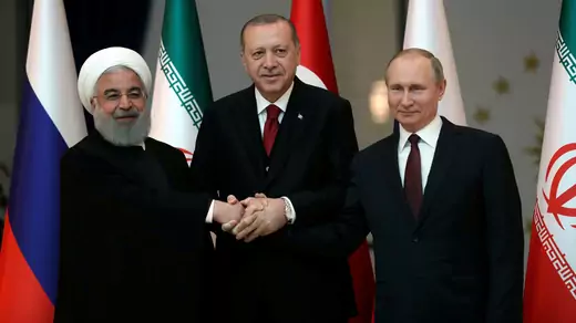 Presidents Hassan Rouhani of Iran, Tayyip Erdogan of Turkey and Vladimir Putin of Russia pose before their meeting in Ankara, Turkey April 4, 2018. 