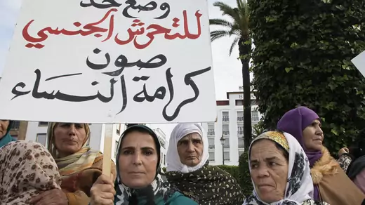 Women from various regions of Morocco protest against violence towards women, in Rabat. The placard reads, "Stopping harassment gives dignity for women."