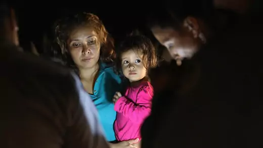 Central American asylum seekers, including a Honduran girl, 2, and her mother, are taken into custody near the U.S.-Mexico border on June 12, 2018 in McAllen, Texas.