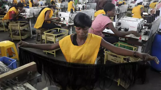 Women work in a fiber hair factory in Ikeja district in Lagos, Nigeria. December 1, 2011.