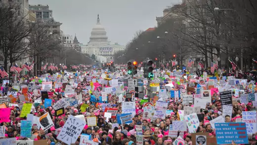 Protesters march on Pennsylvania Avenue during the Women's March in Washington, DC, United States. January 21, 2017.