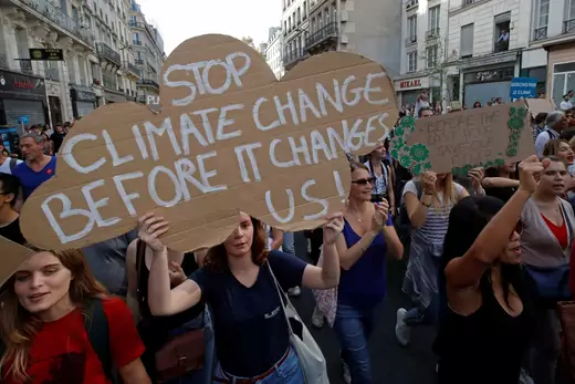 Protesters march to urge politicians to act against climate change