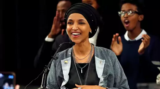 Democratic congressional candidate Ilhan Omar reacts after appearing at her midterm election night party in Minneapolis, Minnesota.