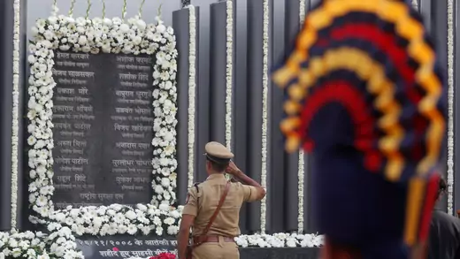 A policeman pays his respects at a memorial to mark the tenth anniversary of the November 26, 2008 attacks, in Mumbai, India, November 26, 2018. REUTERS/Francis Mascarenhas