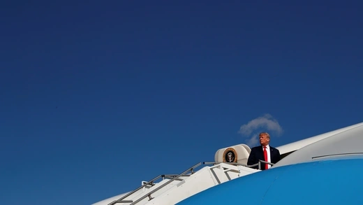 U.S. President Donald Trump boards Air Force One