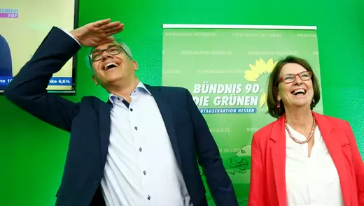 Green party top candidate and Minister of Economics, Energy, Transport and Regional Development of Hesse Tarek Al-Wazir and Minister For The Environment, Climate Protection, Agriculture And Consumer Protection of Hesse Priska Hinz react on first exit polls following the Hesse state election in Wiesbaden, Germany on October 28, 2018