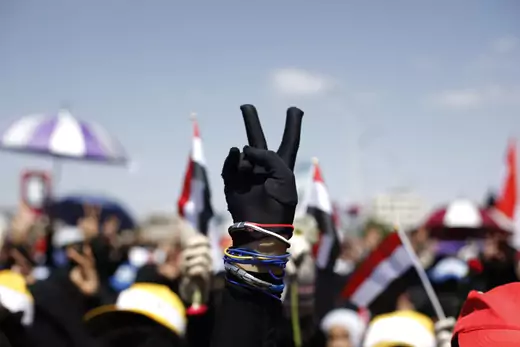 A woman flashes the victory sign during a demonstration to demand the ouster of Yemen's Former President Ali Abdullah Saleh. Sanaa, October 17, 2011.