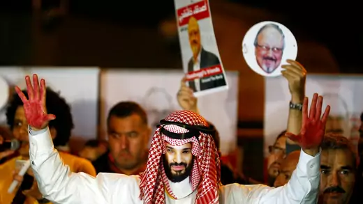 A demonstrator wearing a mask of Saudi Crown Prince Mohammed bin Salman attends a protest outside the Saudi Arabia consulate in Istanbul, Turkey October 25, 2018. REUTERS/Osman Orsal