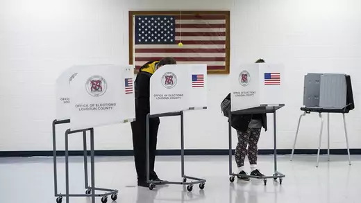 Voters fill out their ballots at Loudon County High School in Leesburg, Virginia, on election day, November 6, 2018.