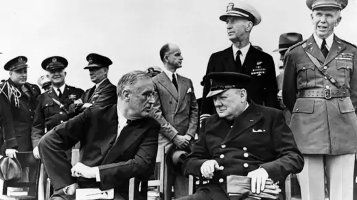 Franklin D. Roosevelt and Winston Churchill meet off the coast of Newfoundland, Canada, in 1941.