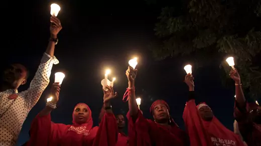 #BringBackOurGirls campaigners raise candles during a candle light gathering marking the 500th day since the abduction of girls in Chibok, Nigeria. August 27, 2015. 