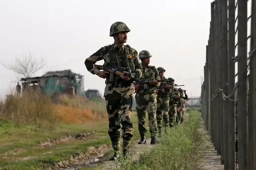 India's Border Security Force (BSF) soldiers patrol along the fenced border with Pakistan in Ranbir Singh Pura sector near Jammu February 26, 2019. REUTERS/Mukesh Gupta
