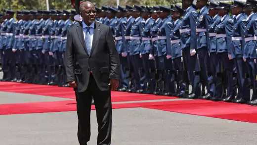 Tanzania's President John Magufuli leaves after inspecting a guard of honour during his official visit to Nairobi, Kenya.