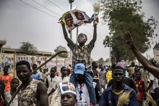 Supporters of Nigerian President Muhammadu Buhari celebrate in Kano.