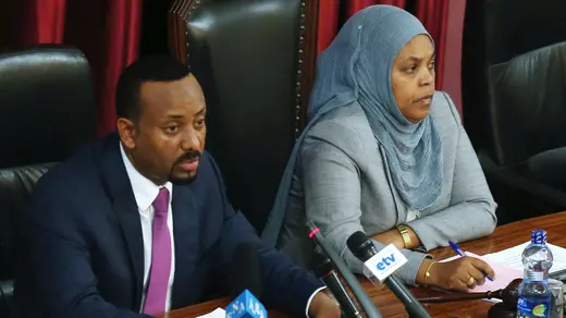 Ethiopia's Prime Minister Abiy Ahmed, and Muferiat Kamil, newly-named Minister of Peace, address members of parliament.